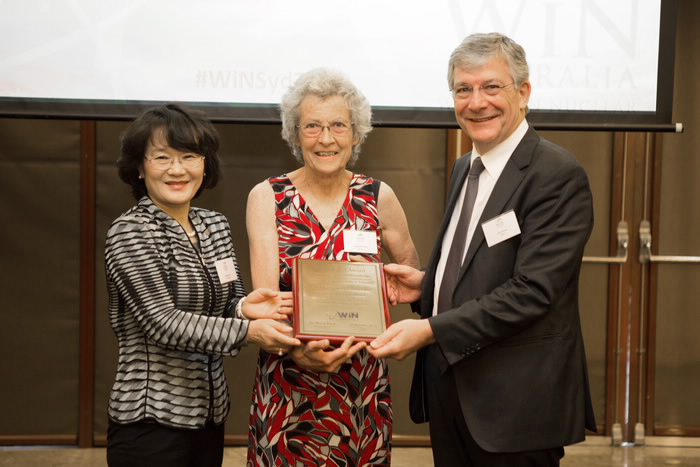 Margaret Elcombe receiving award